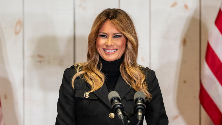 Melania Trump smiling at a rally