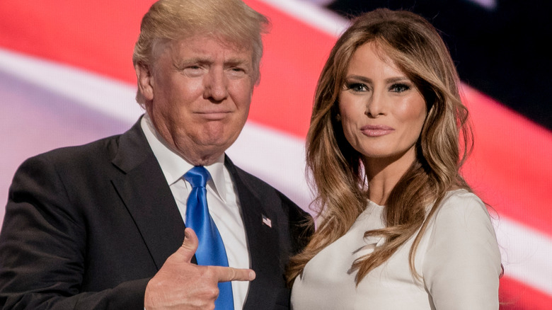 Donald Trump pointing at Melania Trump