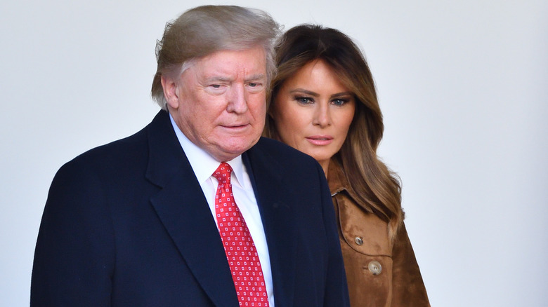 Donald Trump and Melania Trump walking 