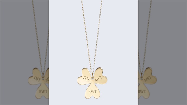 Engraved gold flower necklace