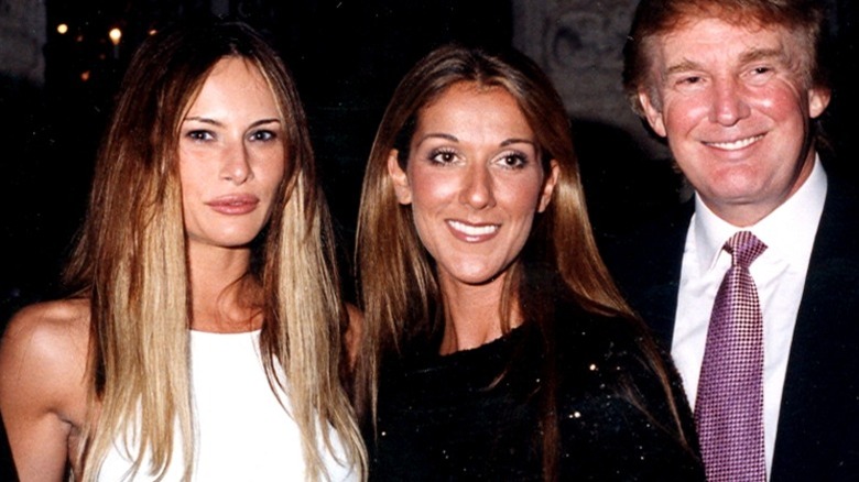 Melania Trump, Celine Dion and Donald Trump at an event in 1999