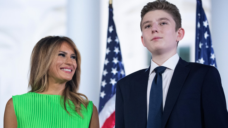 Melania Trump smiles at Barron Trump on stage