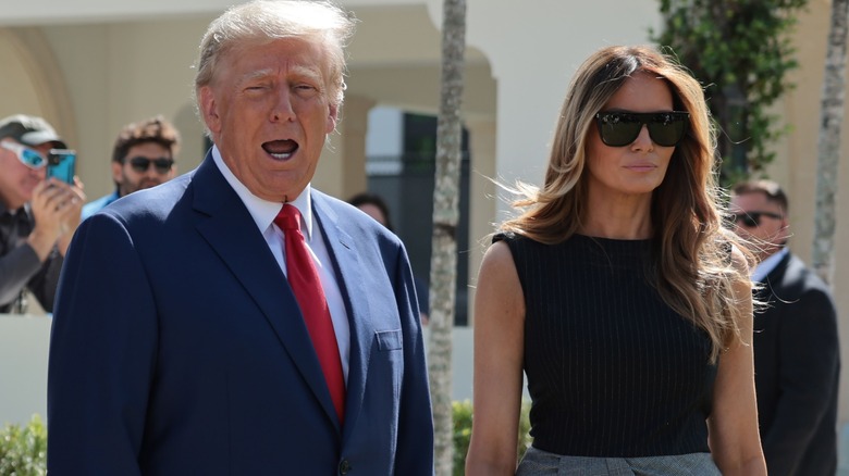 Melania Trump standing next to Donald Trump