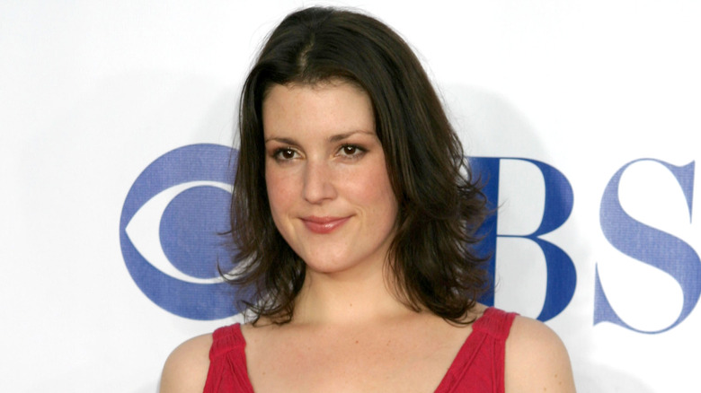 Melanie Lynskey in red dress