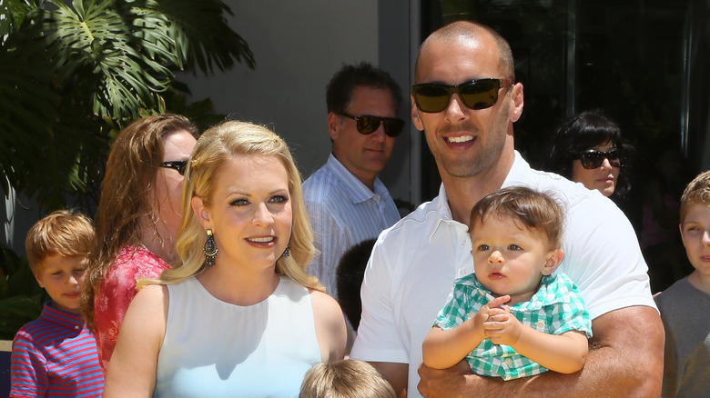 Melissa Joan Hart walking with her husband and son