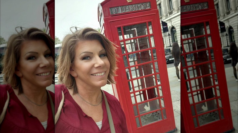 Meri Brown and a red telephone box