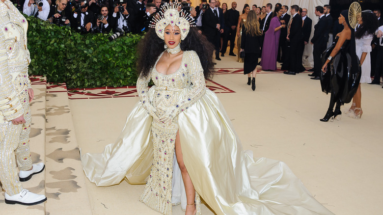 Cardi B in an embellished off white gown