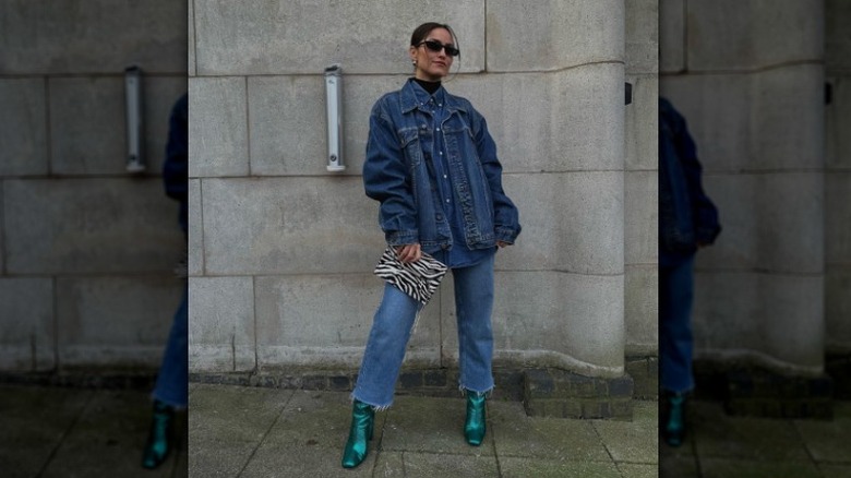 woman posing in full denim outfit