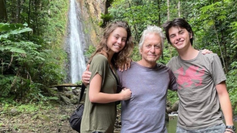 Dylan Douglas and kids by waterfall