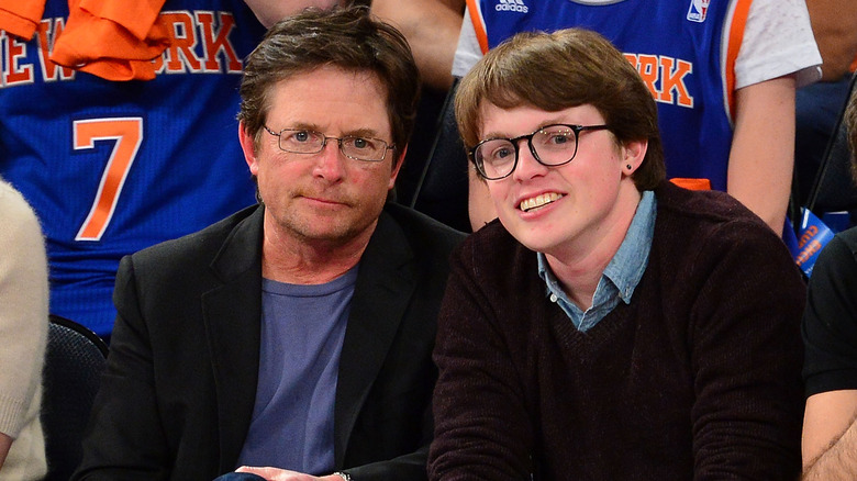 Michael J. Fox and son Sam at basketball game