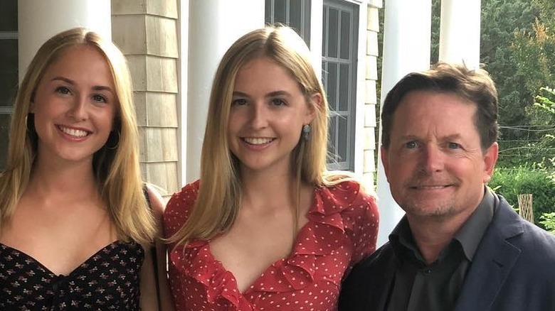 Aquinnah Fox and Schuyler Fox with Michael J Fox on porch