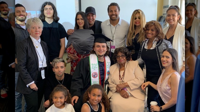 Prince Jackson with family at college graduation