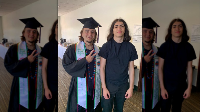 Prince (L) and Bigi (R) Jackson posing for photo at Prince's college graduation in 2019