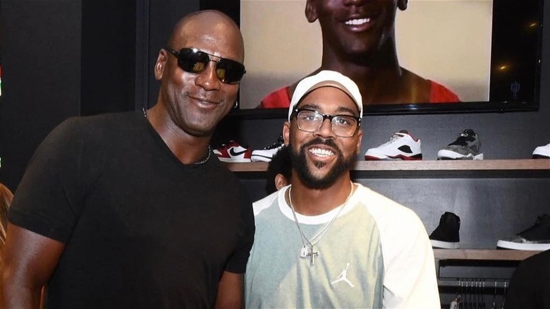 Marcus and Michael Jordan posing