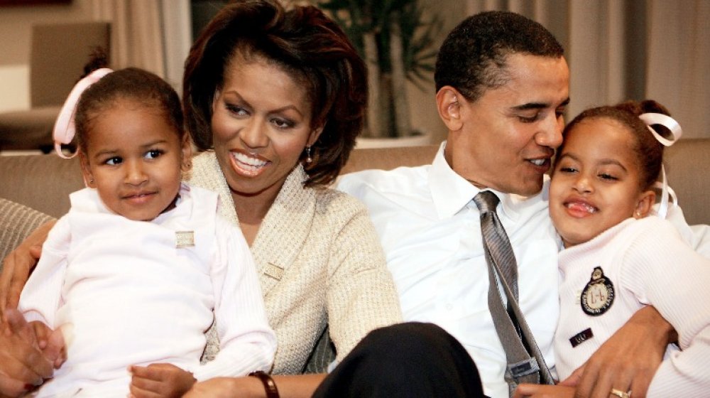 Michelle and Barack Obama with the children