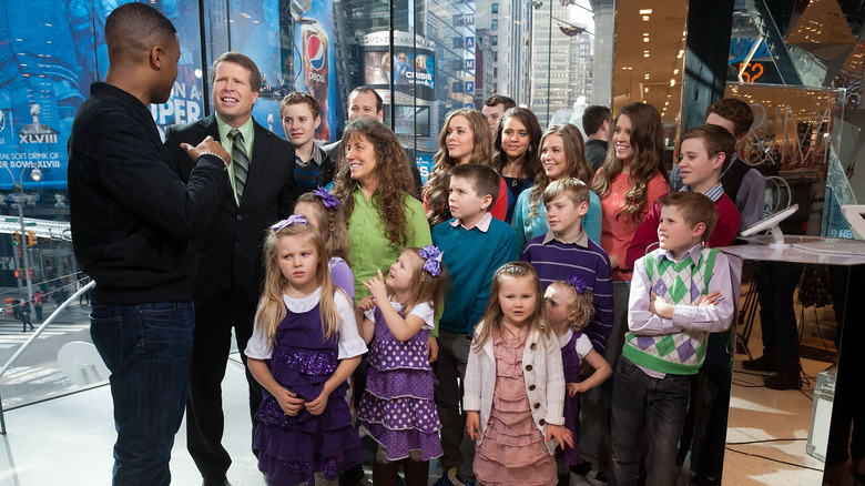 The Duggar family on the set of Extra