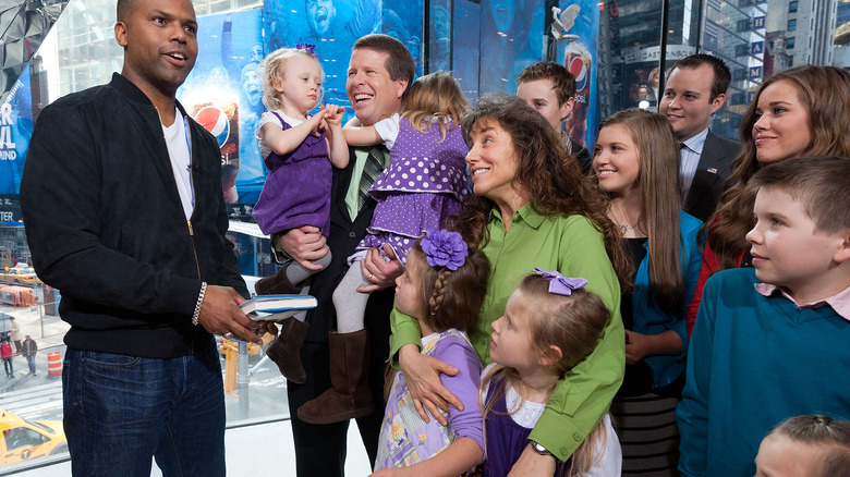 Michelle and Jim Bob Duggar with kids