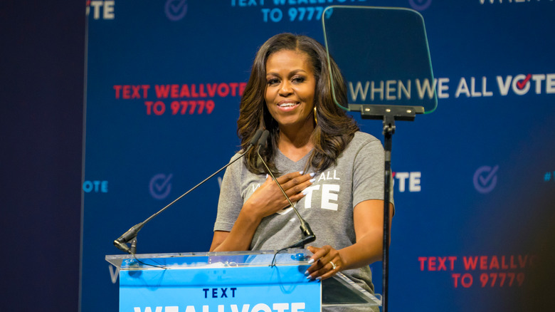 michelle obama speaks at podium