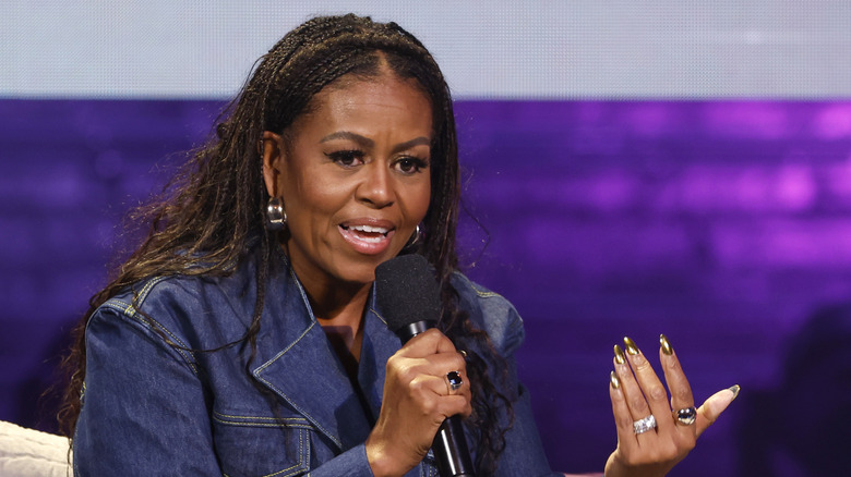 Michelle Obama looking serious while speaking