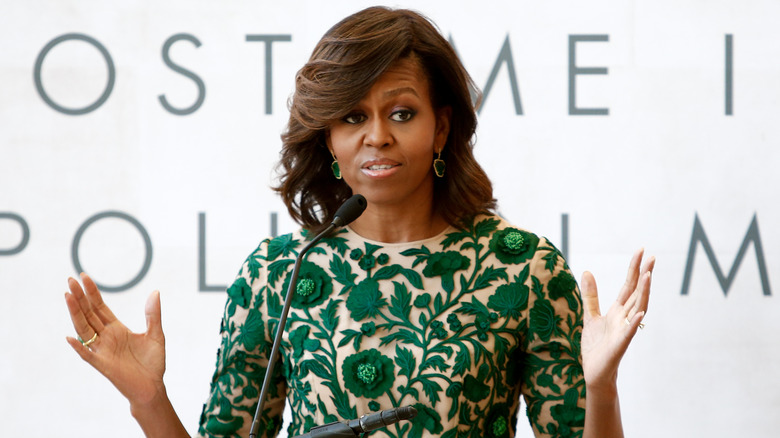 Michelle Obama speaking at podium