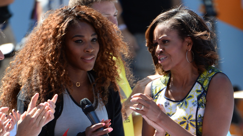 Serena Williams and Michelle Obama speaking at event