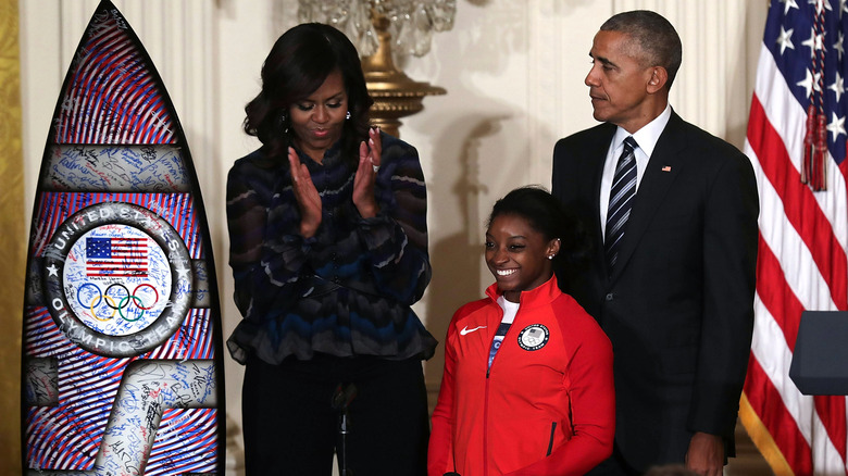 Michelle and Barack Obama with Simone Biles