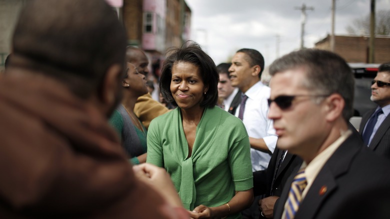 Michelle and Barack Obama talk to citizens