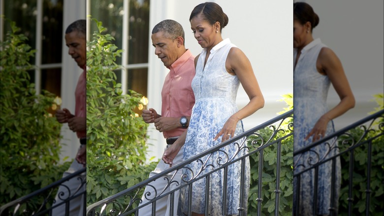 Barack and Michelle Obama walking