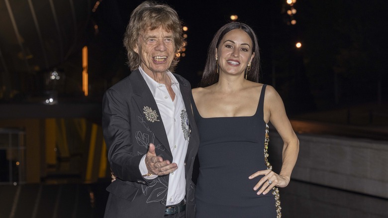 Mick Jagger and Melanie Hamrick posing