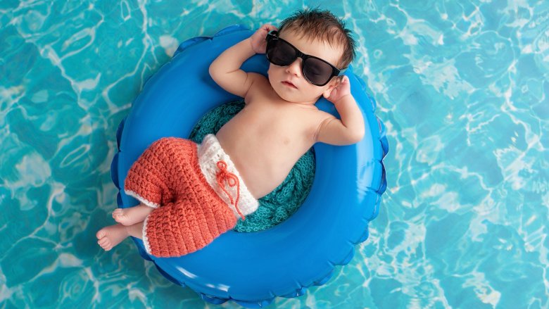 baby relaxing in pool