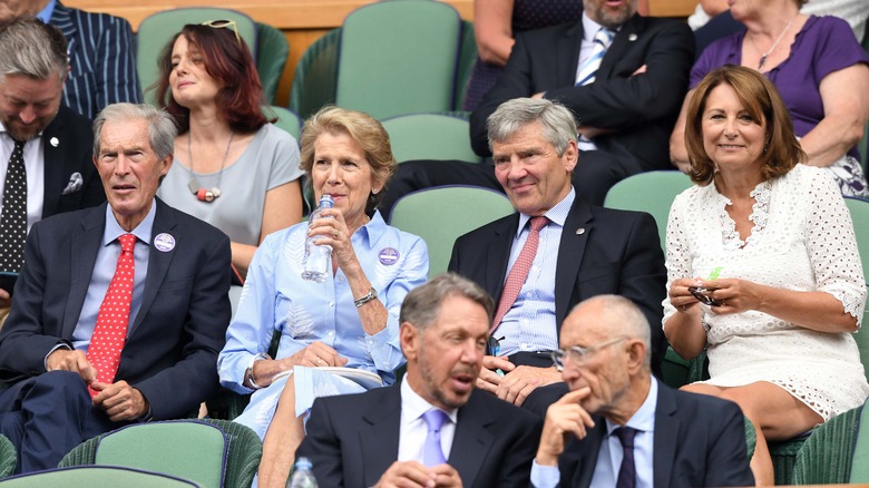 Tony and Jane Henman sitting next to Michael and Carole Middleton