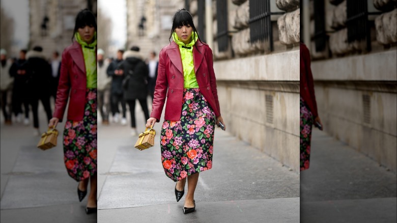 woman wearing floral midi skirt