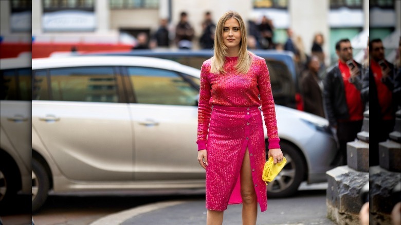 woman in all pink midi skirt outfit