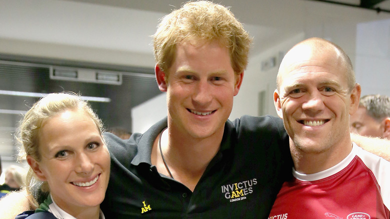 Zara Phillips, Prince Harry, and Mike Tindall smiling