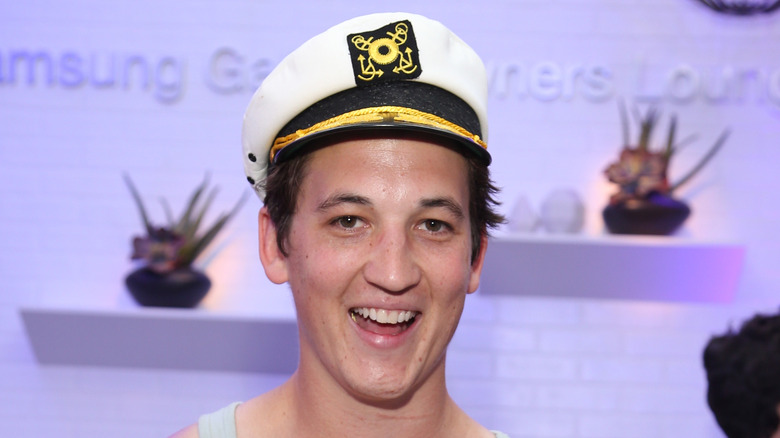 Miles Teller in captain's hat