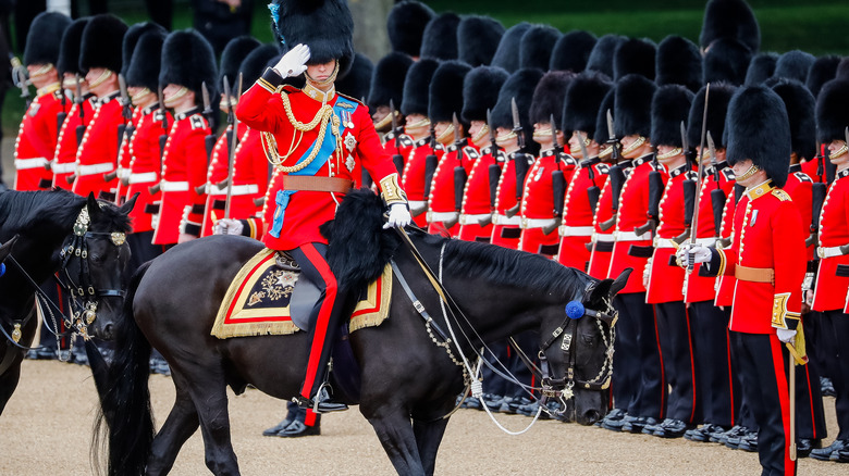 Prince William salutes on his horse