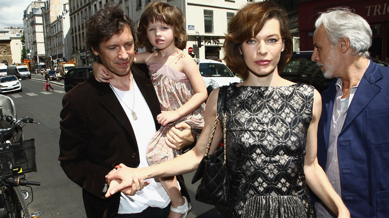 Paul W.S. Anderson, Ever Anderson, and Milla Jovovich