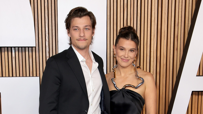 Millie Bobby Brown and Jake Bongiovi at a red carpet 