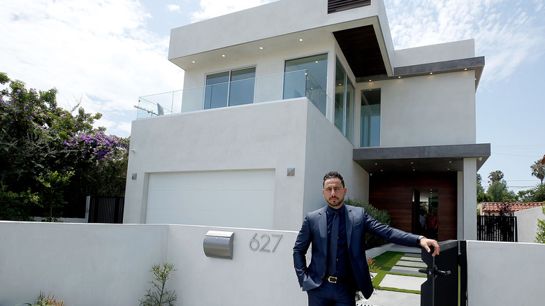 Josh Altman showing a home