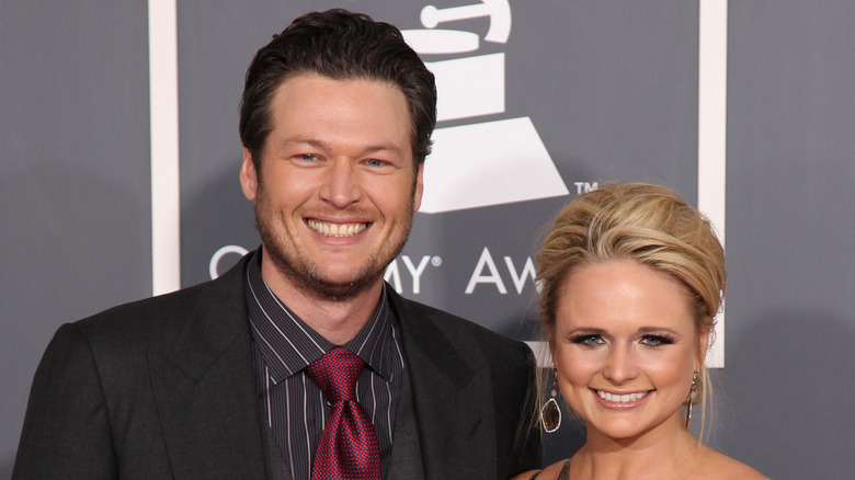 Miranda Lambert and Blake Shelton pose on the red carpet together