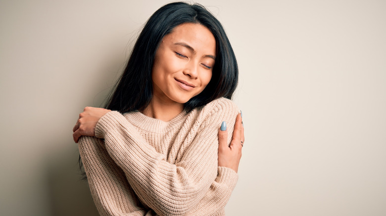 woman wearing cozy cardigan