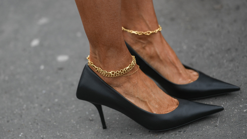 Woman wearing pointed high heels