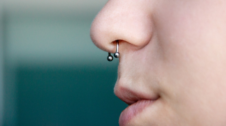 side-view septum piercing