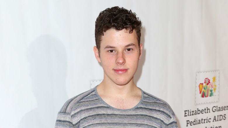 Nolan Gould smiling at a Elizabeth Glaser Pediatric AIDS Foundation event in 2017