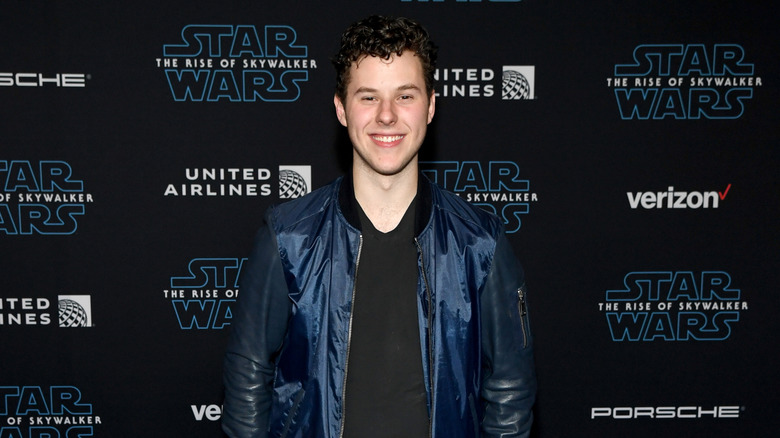 Nolan Gould smiling at Disney's premiere of "Star Wars: The Rise of Skywalker"