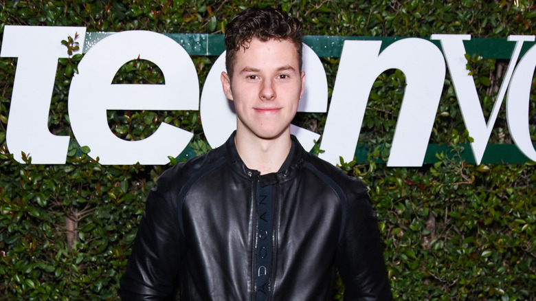 Nolan Gould smiling at Teen Vogue's Hollywood Party