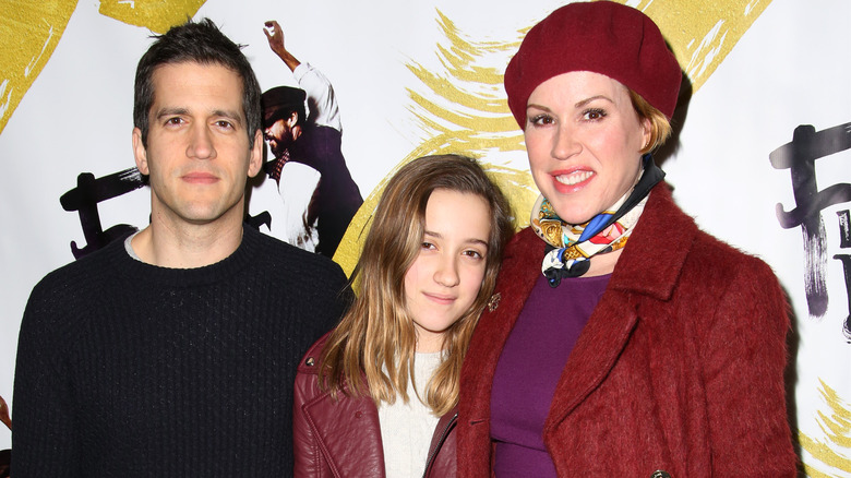 Mathilda Gianopoulos as a child posing with Molly Ringwald and Panio Gianopoulos