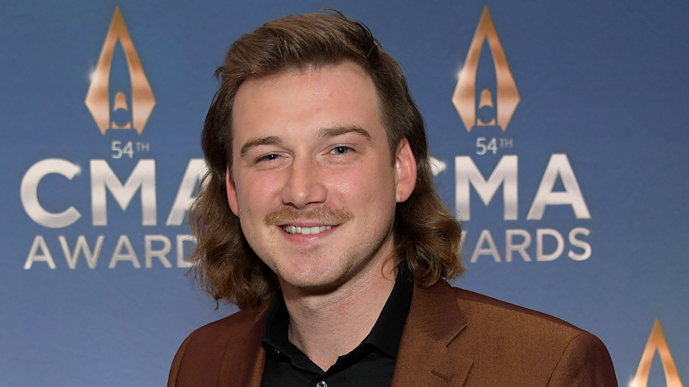 Morgan Wallen in brown suit at CMA Awards