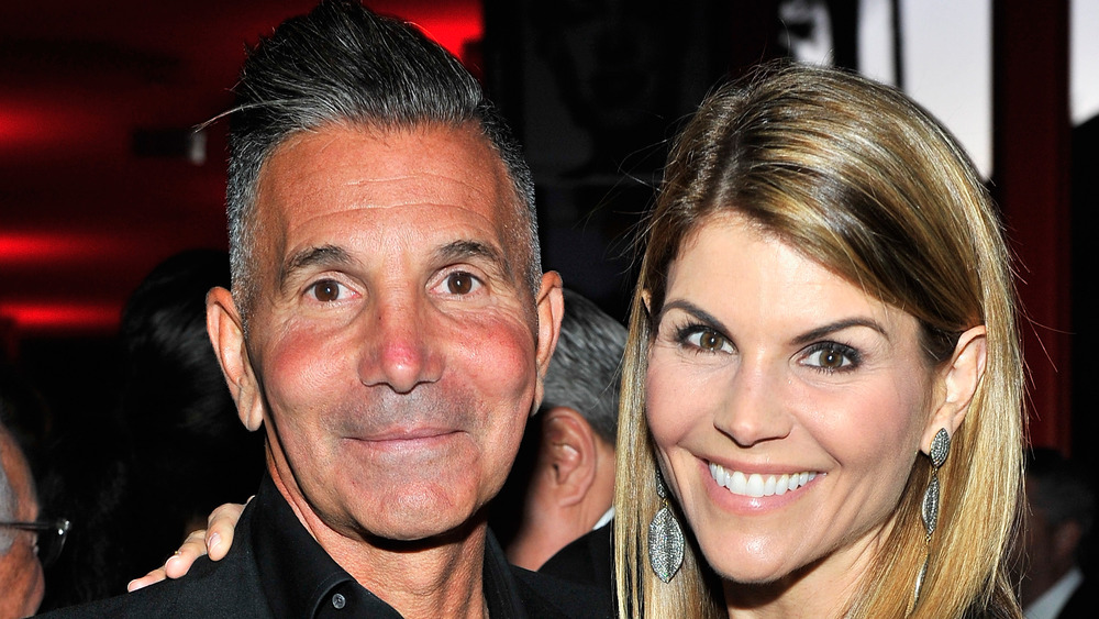 Mossimo Giannulli and wife Lori Laughlin smiling 