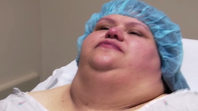 Laura Perez before surgery, laying down